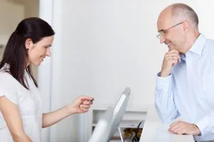 woman entering insurance information
